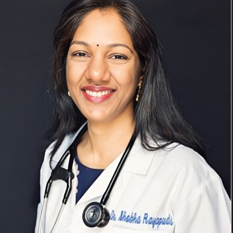 Smiling doctor with stethoscope, black background.