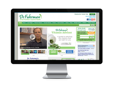 Website homepage displayed on computer monitor.