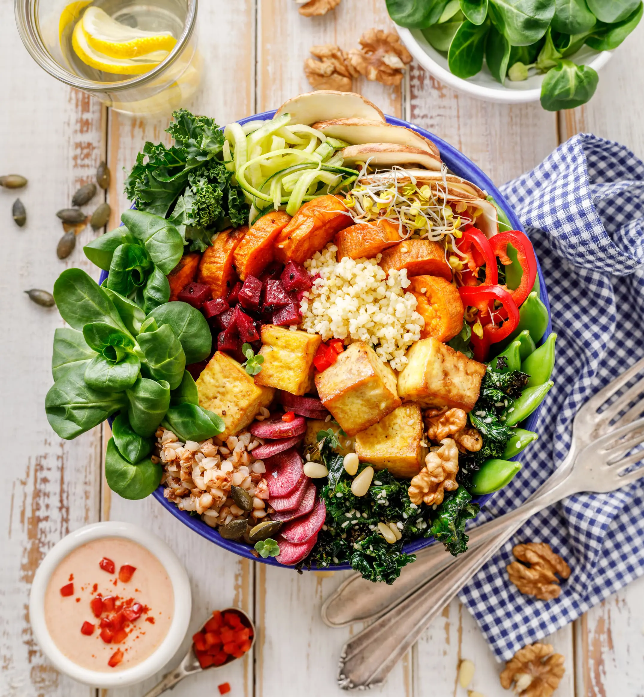 Colorful vegan salad bowl with assorted vegetables.