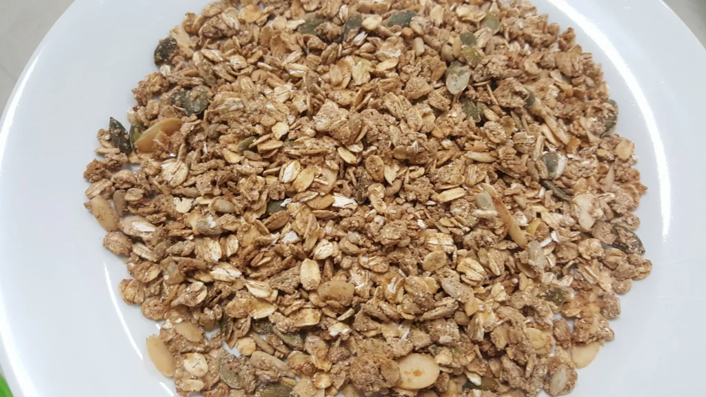Bowl of granola with seeds and nuts.