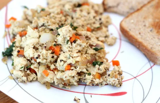 Scrambled tofu with vegetables and toast.