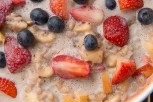 Oatmeal with strawberries and blueberries.
