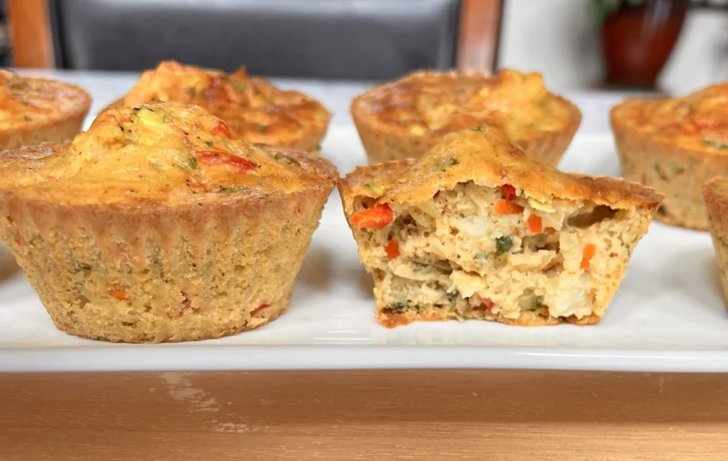 Mini vegetable muffins on a white plate.