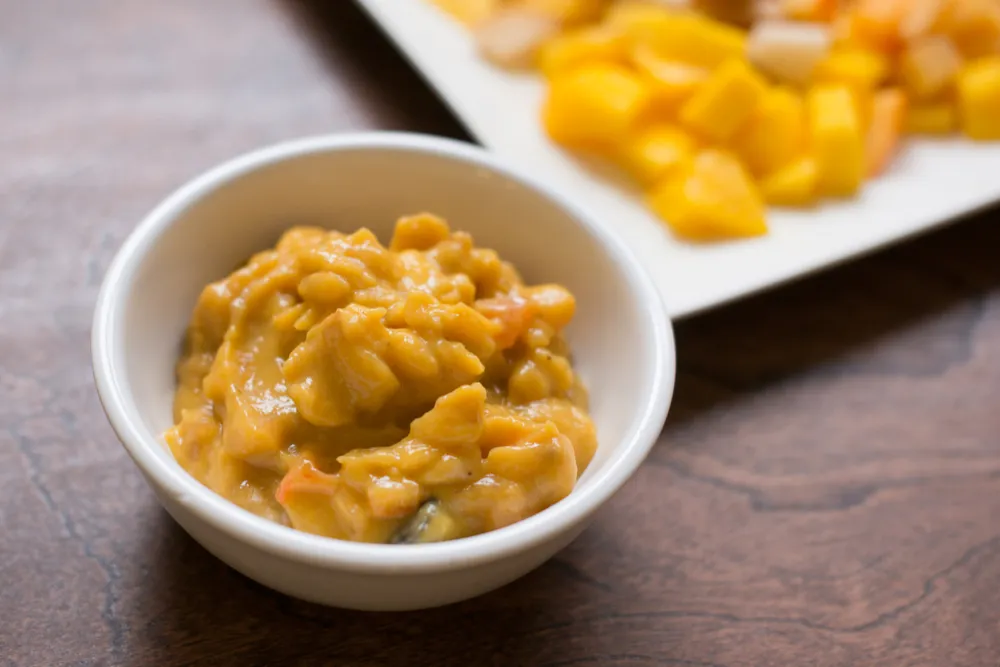 Bowl of mango chutney with diced fruit.