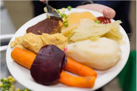 Plate with assorted vegetables and mashed potatoes.
