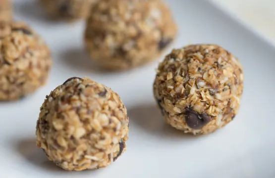 Oatmeal chocolate chip energy bites on plate.