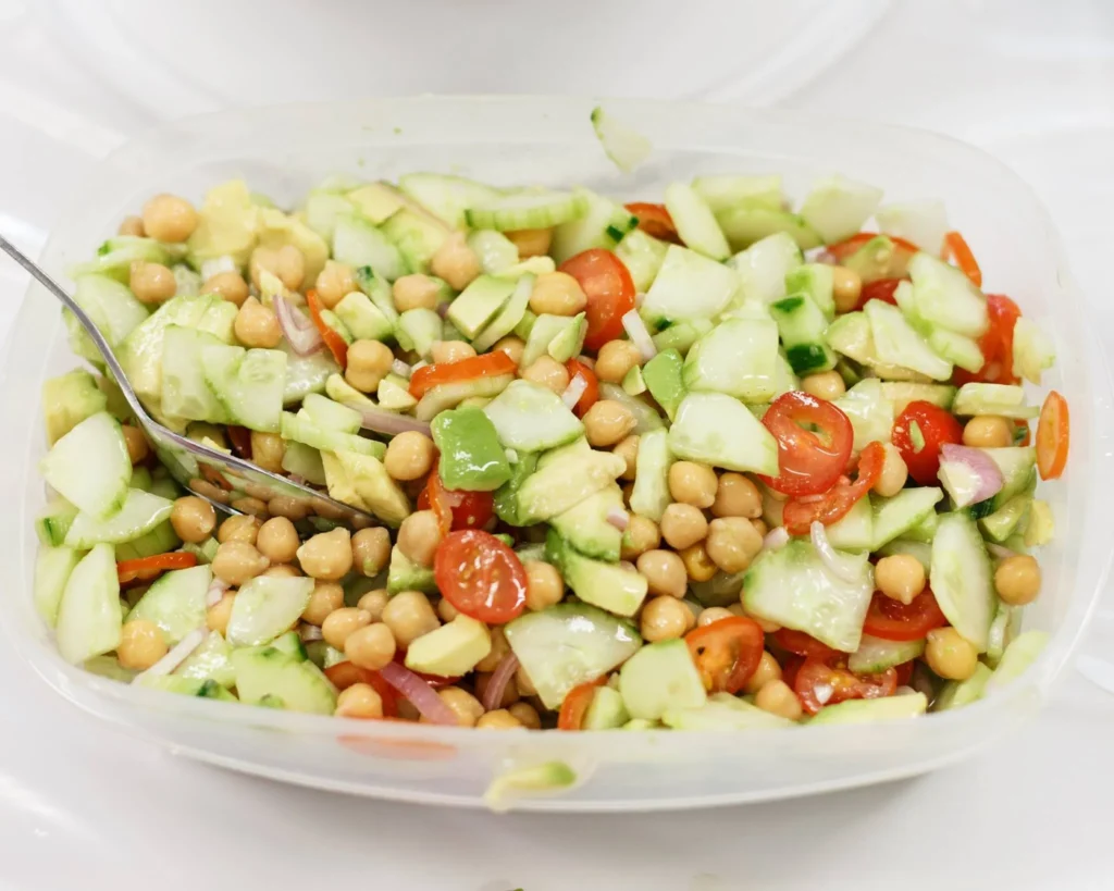 Chickpea salad with cucumbers and tomatoes.