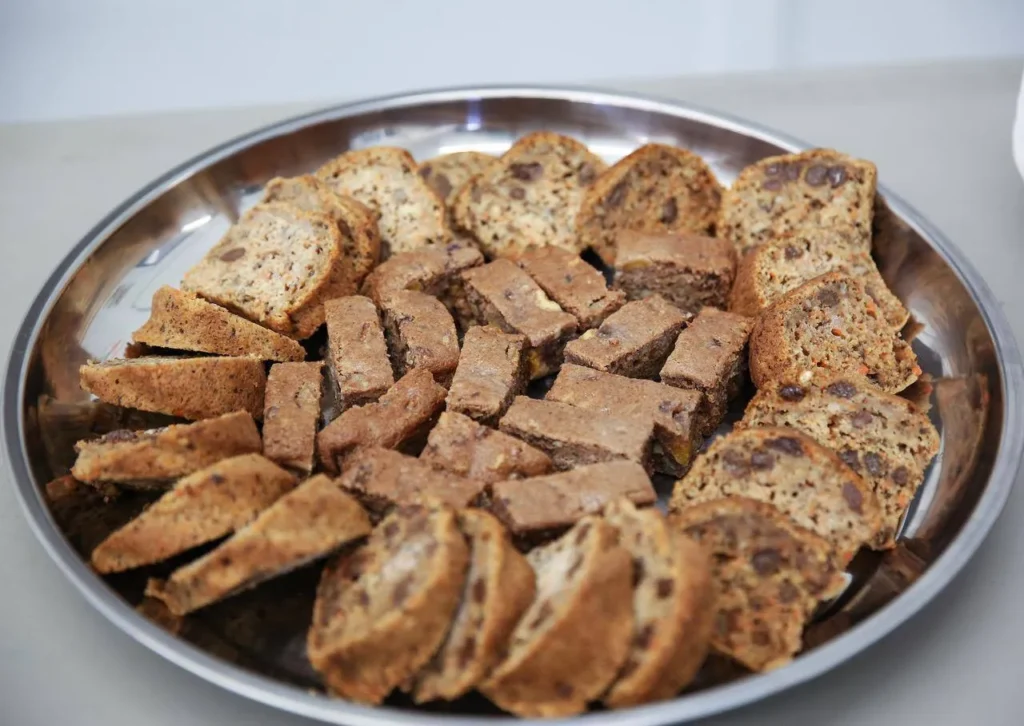 Plate of assorted sliced bread and biscuits.