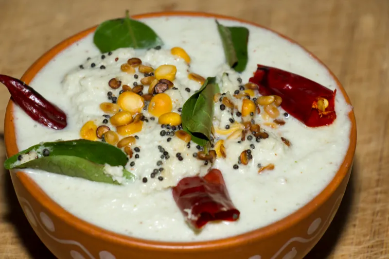 Coconut chutney with spices and herbs.