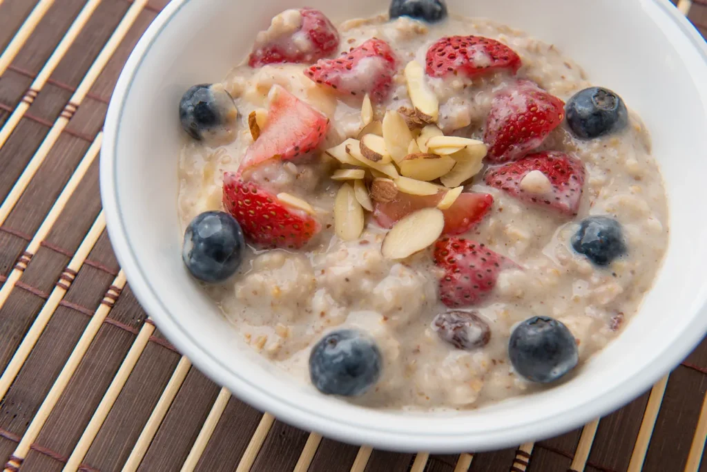 Oatmeal with strawberries, blueberries, and almonds.