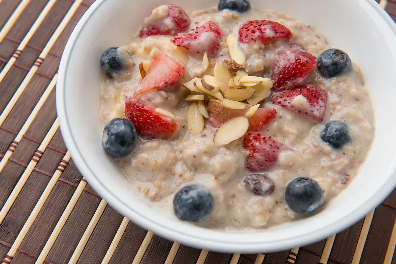 Oatmeal with strawberries, blueberries, and almonds.